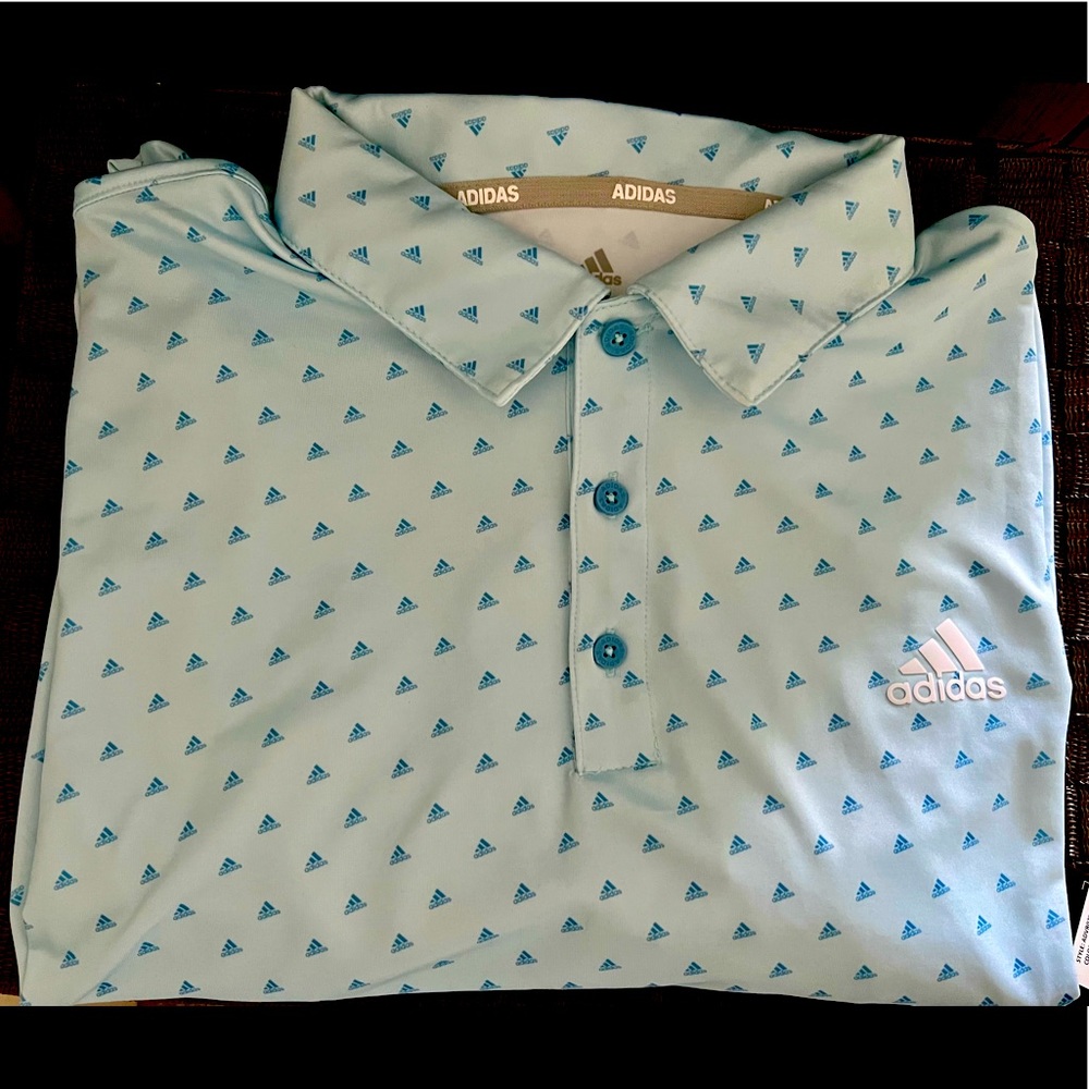 NTW  Adidas Polo Shirt. Light material ideal to use during summer.